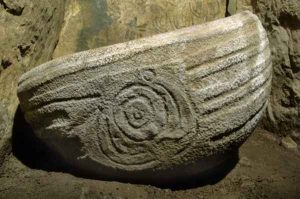 Decorated basin stone in recess on the right of Knowth's eastern chamber