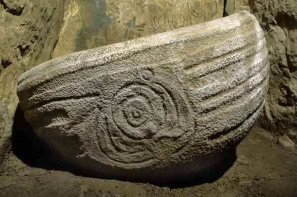 Decorated basin stone in recess on the right of Knowth's eastern chamber