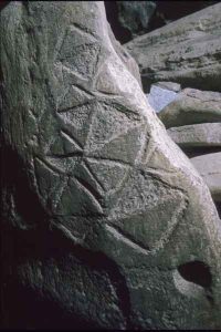 Lozenge motifs on orthostat in passage at Newgrange